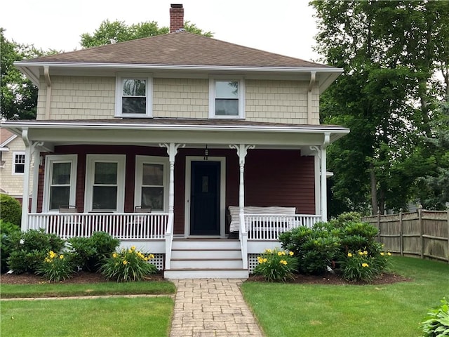 40 Vine St, East Greenwich, RI 02818 - american foursquare style home with a chimney, roof with shingles, and covered porch