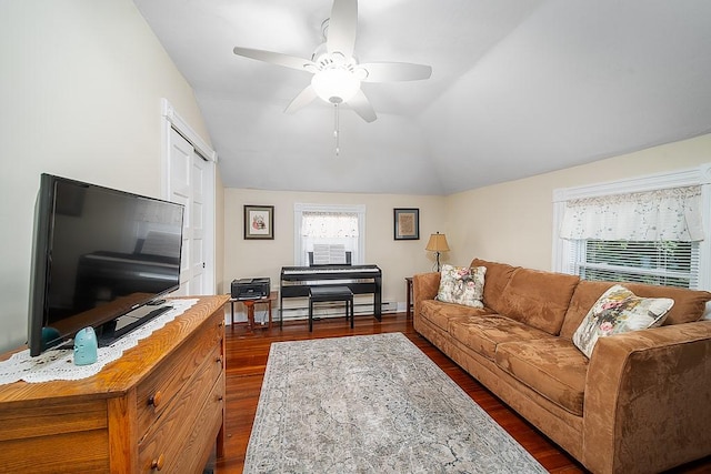 40 Vine St, East Greenwich, RI 02818 - living area with dark wood-style floors, ceiling fan, lofted ceiling, and a baseboard heating unit