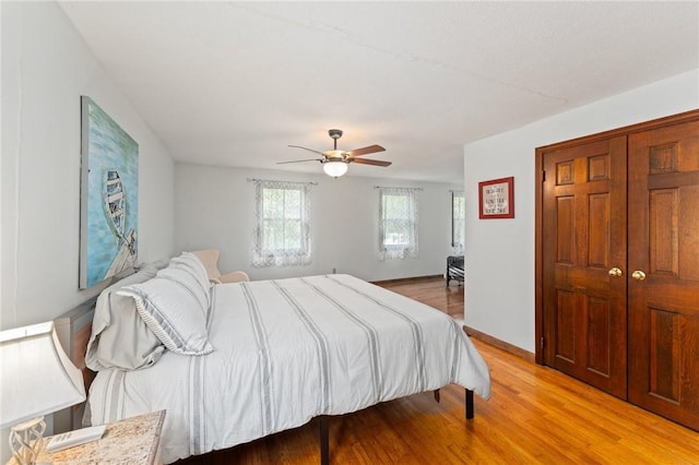 1451 Ministerial Rd, South Kingstown, RI 02879 - bedroom featuring light wood-type flooring, ceiling fan, and a closet