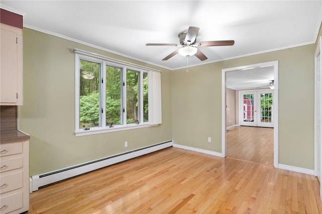 9 Esek Hopkins Rd, Scituate, RI 02857 - empty room featuring a baseboard radiator, a ceiling fan, light wood-style floors, french doors, and ornamental molding