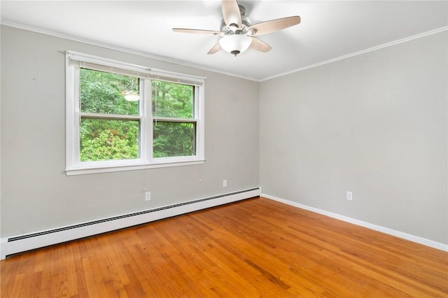 9 Esek Hopkins Rd, Scituate, RI 02857 - empty room with baseboard heating, crown molding, ceiling fan, and wood finished floors
