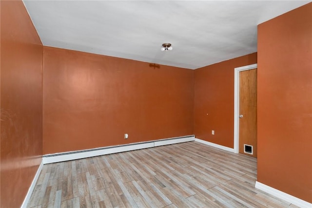 9 Esek Hopkins Rd, Scituate, RI 02857 - spare room featuring baseboard heating and light wood-type flooring
