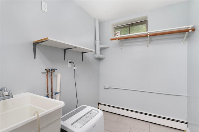 9 Esek Hopkins Rd, Scituate, RI 02857 - laundry area with a baseboard radiator and hookup for a washing machine