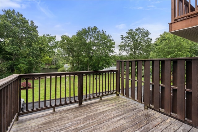 97 Farnum Pike Unit 7, Smithfield, RI 02917 - wooden deck featuring a lawn and view of scattered trees