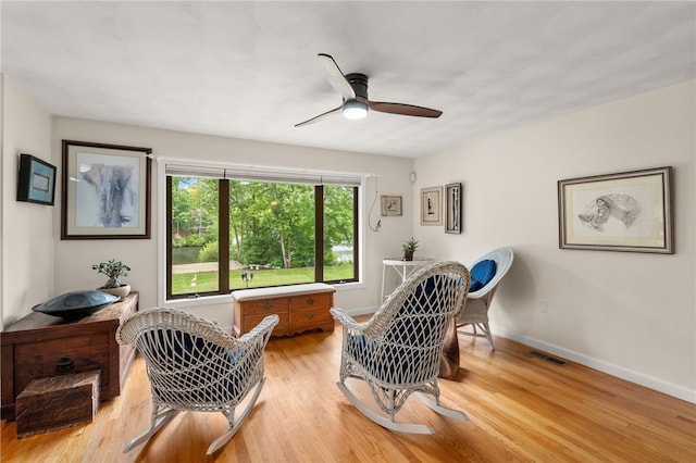 97 Farnum Pike Unit 7, Smithfield, RI 02917 - living area featuring a ceiling fan and light wood-type flooring