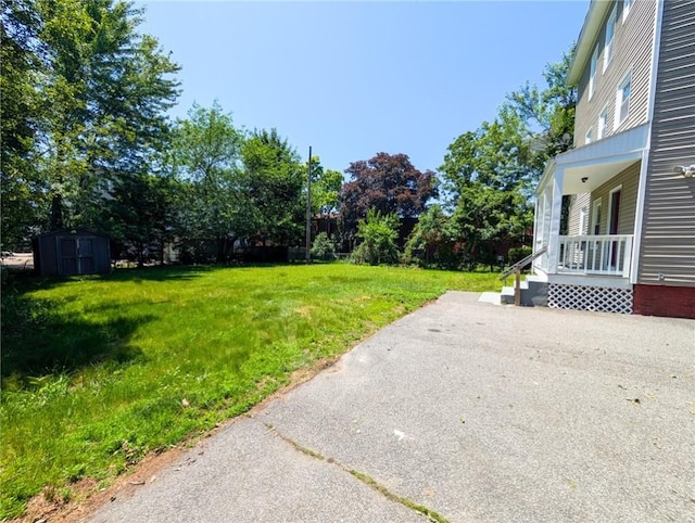 5 Stearns St, Pawtucket, RI 02861 - view of green lawn featuring a storage unit