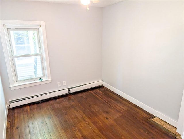 5 Stearns St, Pawtucket, RI 02861 - unfurnished room with baseboard heating, ceiling fan, and dark wood-type flooring