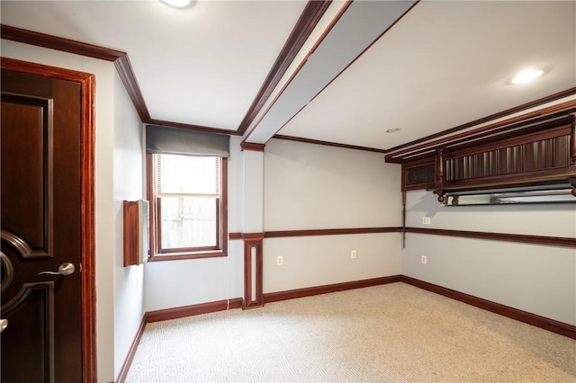 10 Hendricks St, South Kingstown, RI 02879 - below grade area with ornamental molding and light colored carpet