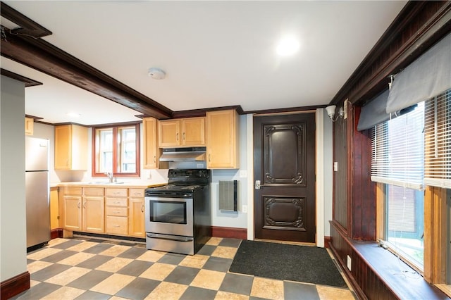 10 Hendricks St, South Kingstown, RI 02879 - kitchen with electric stove, under cabinet range hood, light brown cabinetry, freestanding refrigerator, and ornamental molding