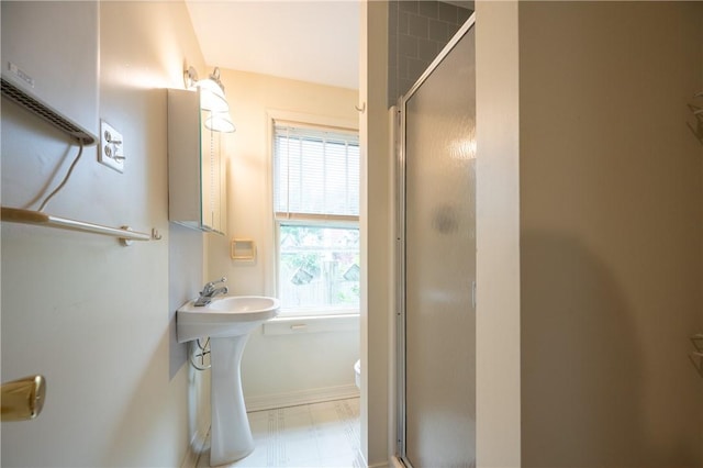10 Hendricks St, South Kingstown, RI 02879 - full bathroom with a stall shower and tile patterned floors