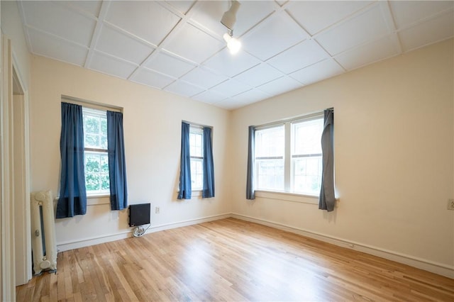 10 Hendricks St, South Kingstown, RI 02879 - spare room featuring radiator and wood finished floors