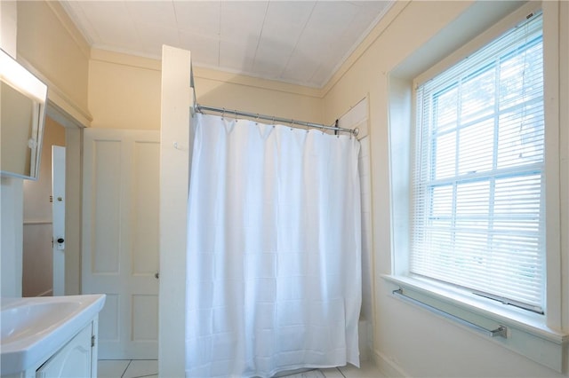 10 Hendricks St, South Kingstown, RI 02879 - bathroom featuring vanity, crown molding, and shower / bathtub combination with curtain