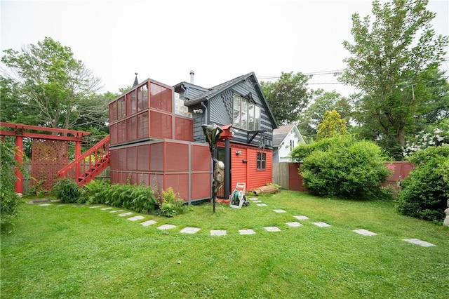 10 Hendricks St, South Kingstown, RI 02879 - rear view of property with stairs and an outdoor structure