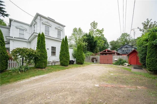 10 Hendricks St, South Kingstown, RI 02879 - view of yard with a storage shed and driveway