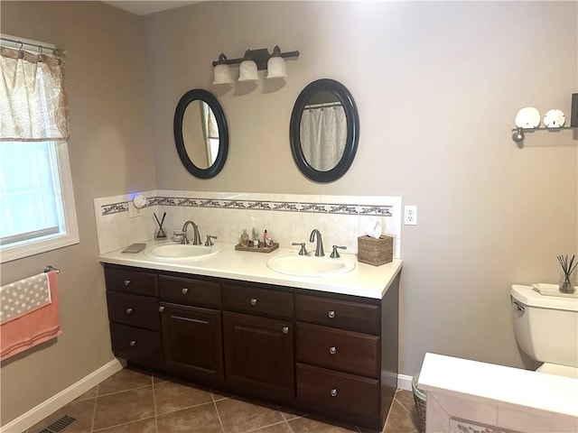 14 Piezzo Dr, Westerly, RI 02891 - full bath with double vanity and tile patterned flooring