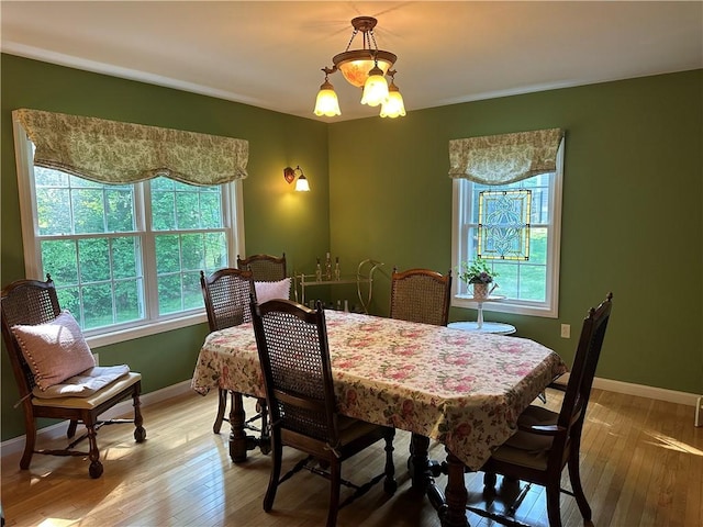 14 Piezzo Dr, Westerly, RI 02891 - dining space with healthy amount of natural light and light wood-style floors