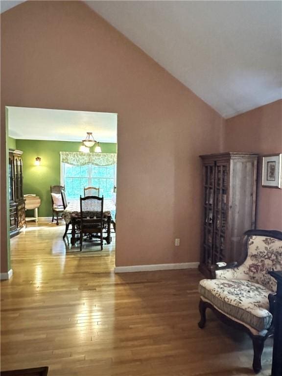 14 Piezzo Dr, Westerly, RI 02891 - sitting room featuring wood finished floors and high vaulted ceiling