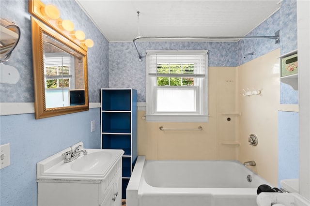 34 Tilden Ave, Warwick, RI 02888 - full bathroom featuring shower / tub combination, vanity, and wallpapered walls