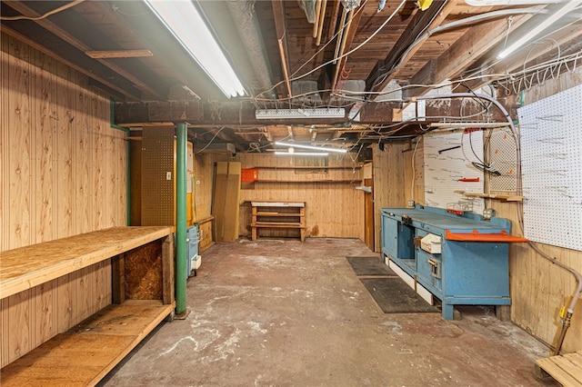 34 Tilden Ave, Warwick, RI 02888 - unfinished below grade area with a workshop area and wooden walls