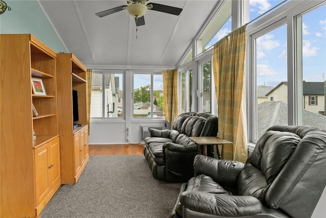 167 Carter Ave, Pawtucket, RI 02861 - sunroom / solarium featuring lofted ceiling, plenty of natural light, wood finished floors, and an AC wall unit