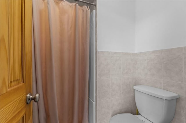 167 Carter Ave, Pawtucket, RI 02861 - full bath with a shower with shower curtain and tile walls