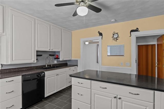 167 Carter Ave, Pawtucket, RI 02861 - kitchen with black dishwasher, dark countertops, and white cabinetry