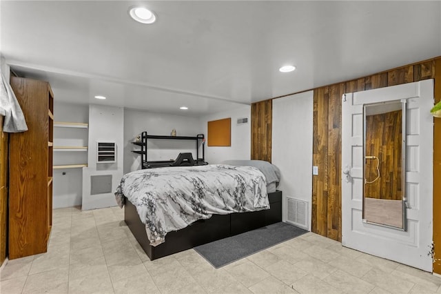 167 Carter Ave, Pawtucket, RI 02861 - bedroom with recessed lighting, heating unit, and light tile patterned floors