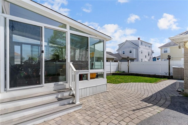167 Carter Ave, Pawtucket, RI 02861 - view of patio with entry steps and a sunroom