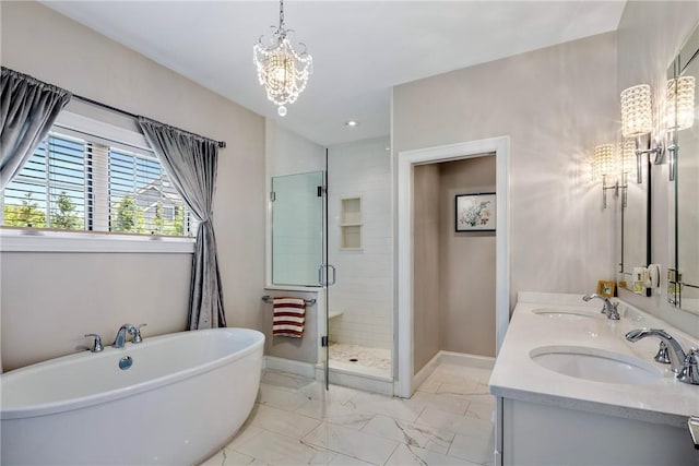 42 Aubin St, Seekonk, MA 02771 - bathroom featuring a soaking tub, marble finish floors, a chandelier, double vanity, and a shower stall