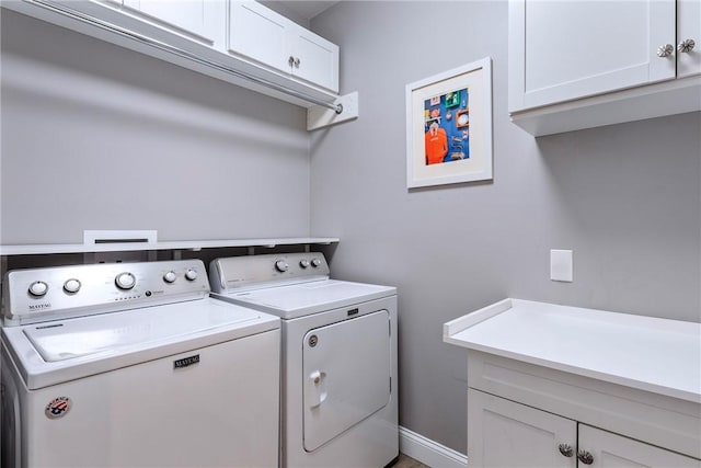 42 Aubin St, Seekonk, MA 02771 - washroom featuring washer and clothes dryer and cabinet space