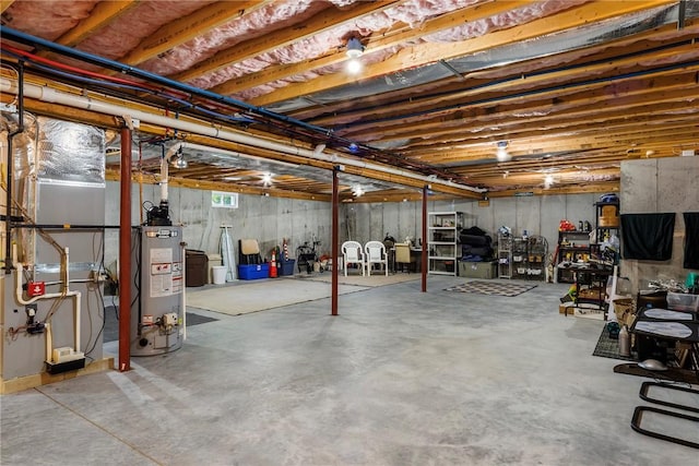 42 Aubin St, Seekonk, MA 02771 - unfinished below grade area with gas water heater and heating unit