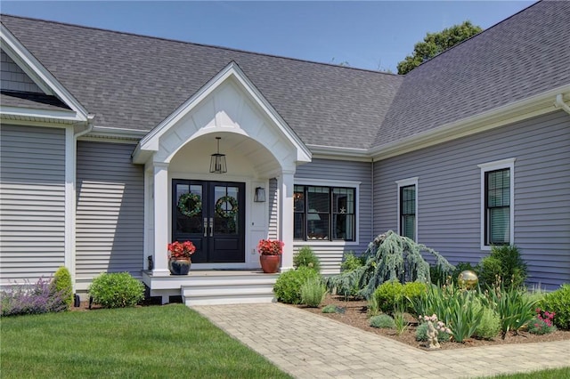 42 Aubin St, Seekonk, MA 02771 - doorway to property with french doors and a shingled roof