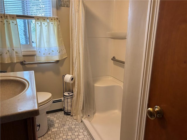 70 Partition St, Warwick, RI 02888 - full bathroom featuring baseboard heating, a stall shower, and vanity