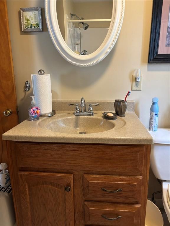 70 Partition St, Warwick, RI 02888 - bathroom featuring vanity and toilet