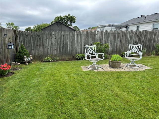 70 Partition St, Warwick, RI 02888 - fenced backyard featuring a patio area