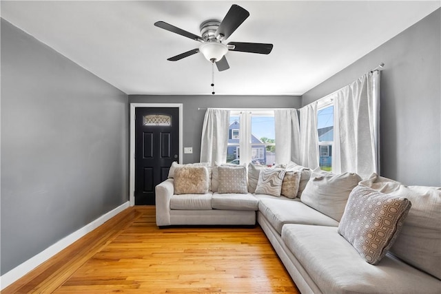 166 Midwood St, Cranston, RI 02910 - living area with light wood-style flooring and a ceiling fan