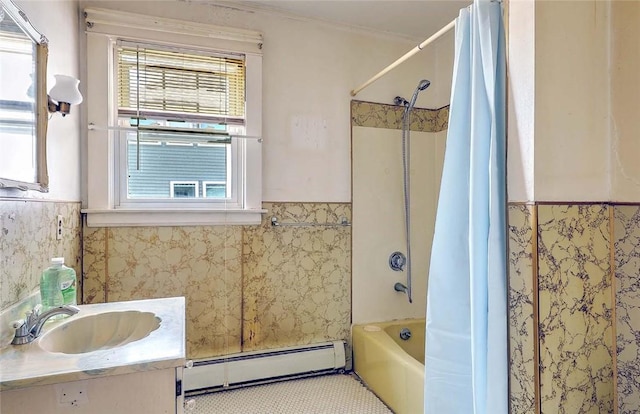 59 Colonial Ave, Cranston, RI 02910 - full bath featuring a baseboard heating unit, a wainscoted wall, vanity, shower / bath combo, and tile patterned floors