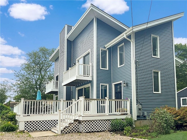 34 Beach Plum Rd, Narragansett, RI 02882 - view of side of home featuring a balcony and a wooden deck
