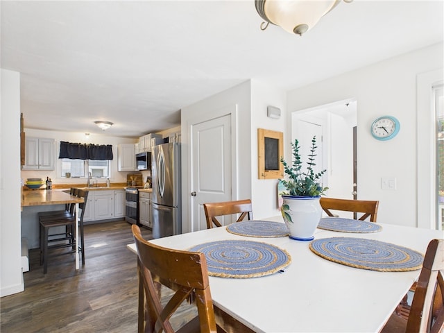 34 Beach Plum Rd, Narragansett, RI 02882 - dining area with dark wood finished floors