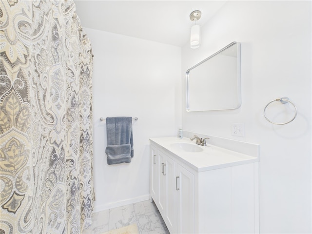 34 Beach Plum Rd, Narragansett, RI 02882 - full bathroom featuring vanity, marble look tiles, and a shower with shower curtain