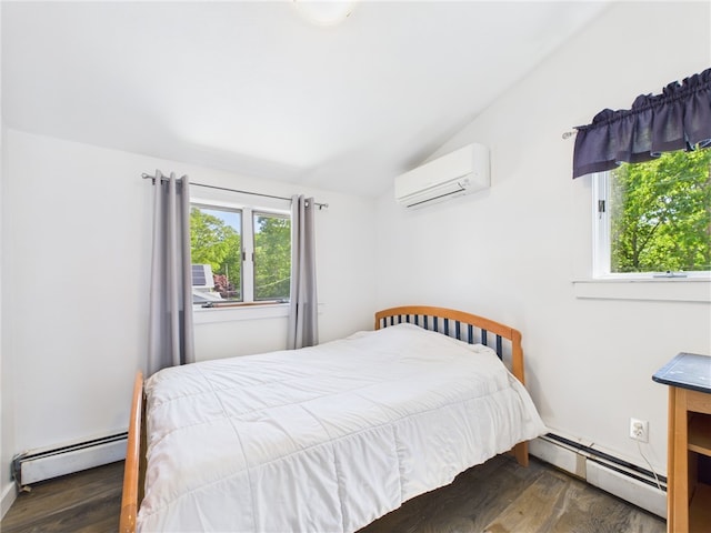 34 Beach Plum Rd, Narragansett, RI 02882 - bedroom featuring a wall mounted AC, baseboard heating, wood finished floors, and vaulted ceiling