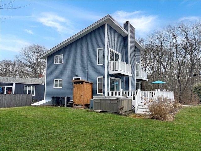 34 Beach Plum Rd, Narragansett, RI 02882 - back of house with a hot tub, a chimney, and a balcony