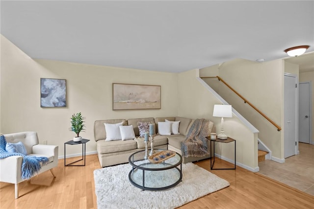 180 Fishing Cove Rd, North Kingstown, RI 02852 - living area with stairs and wood finished floors