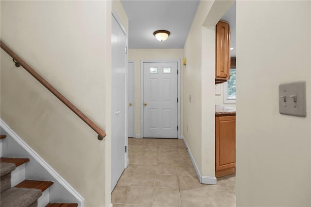 180 Fishing Cove Rd, North Kingstown, RI 02852 - entryway featuring stairway and light tile patterned flooring