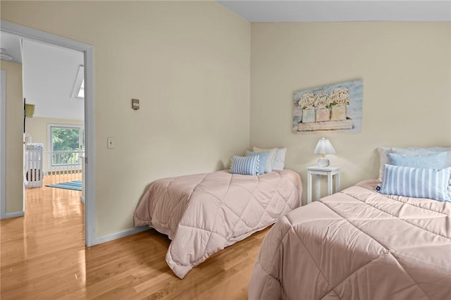 180 Fishing Cove Rd, North Kingstown, RI 02852 - bedroom featuring light wood-style flooring and baseboards