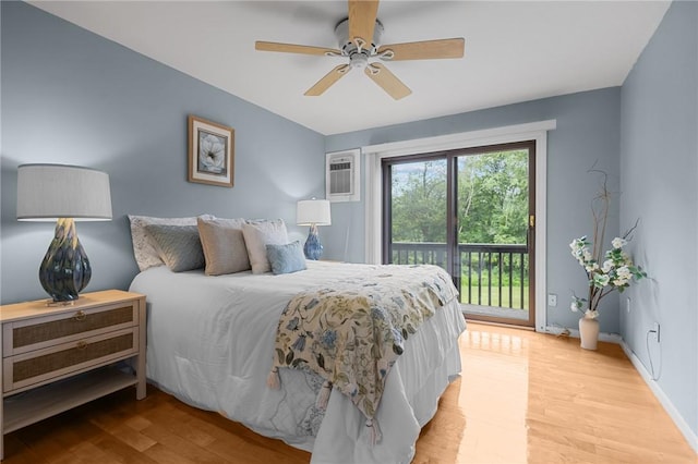 180 Fishing Cove Rd, North Kingstown, RI 02852 - bedroom with access to exterior, light wood-type flooring, a wall mounted air conditioner, and a ceiling fan