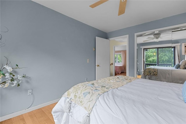 180 Fishing Cove Rd, North Kingstown, RI 02852 - bedroom with wood finished floors, ceiling fan, and access to exterior