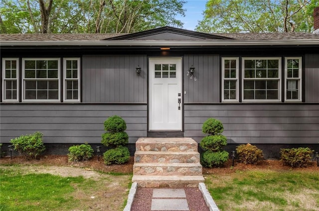 226 Quaker Ln, Scituate, RI 02857 - view of front of home with roof with shingles and a chimney