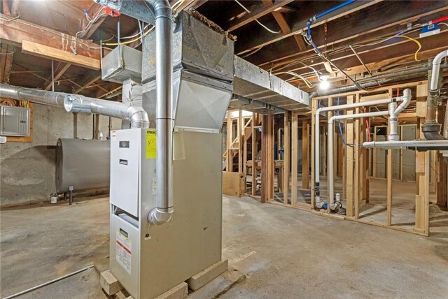 226 Quaker Ln, Scituate, RI 02857 - unfinished below grade area with electric panel and oil tank