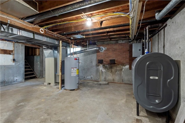 226 Quaker Ln, Scituate, RI 02857 - basement with electric water heater, oil tank, electric panel, and stairway